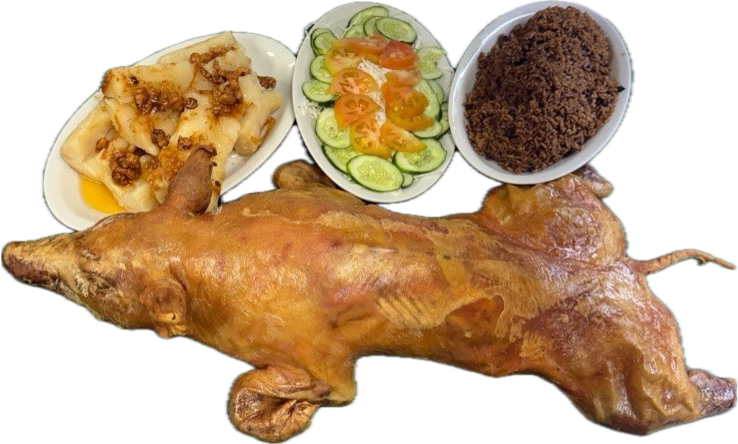 Puerquito mamón y guarniciones.